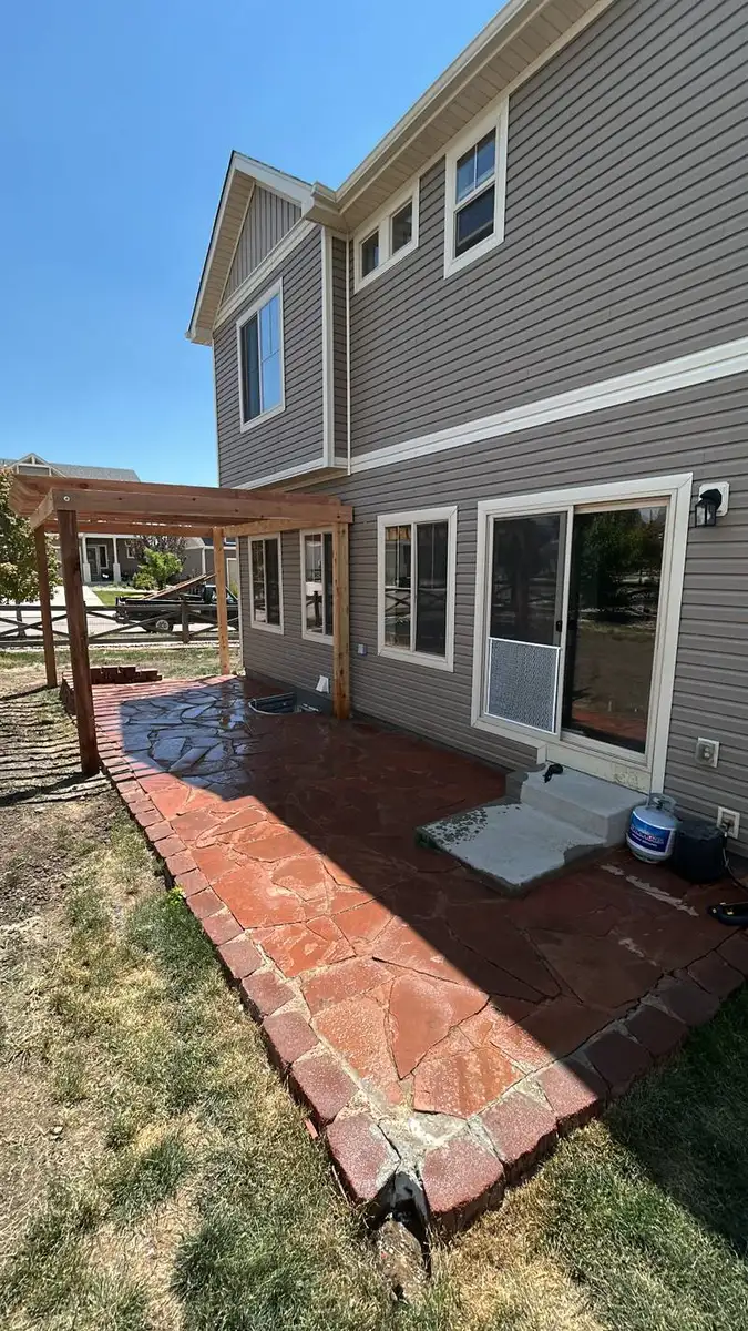 Flagstone patio with pergola installed by CN Landscaping in Colorado Springs