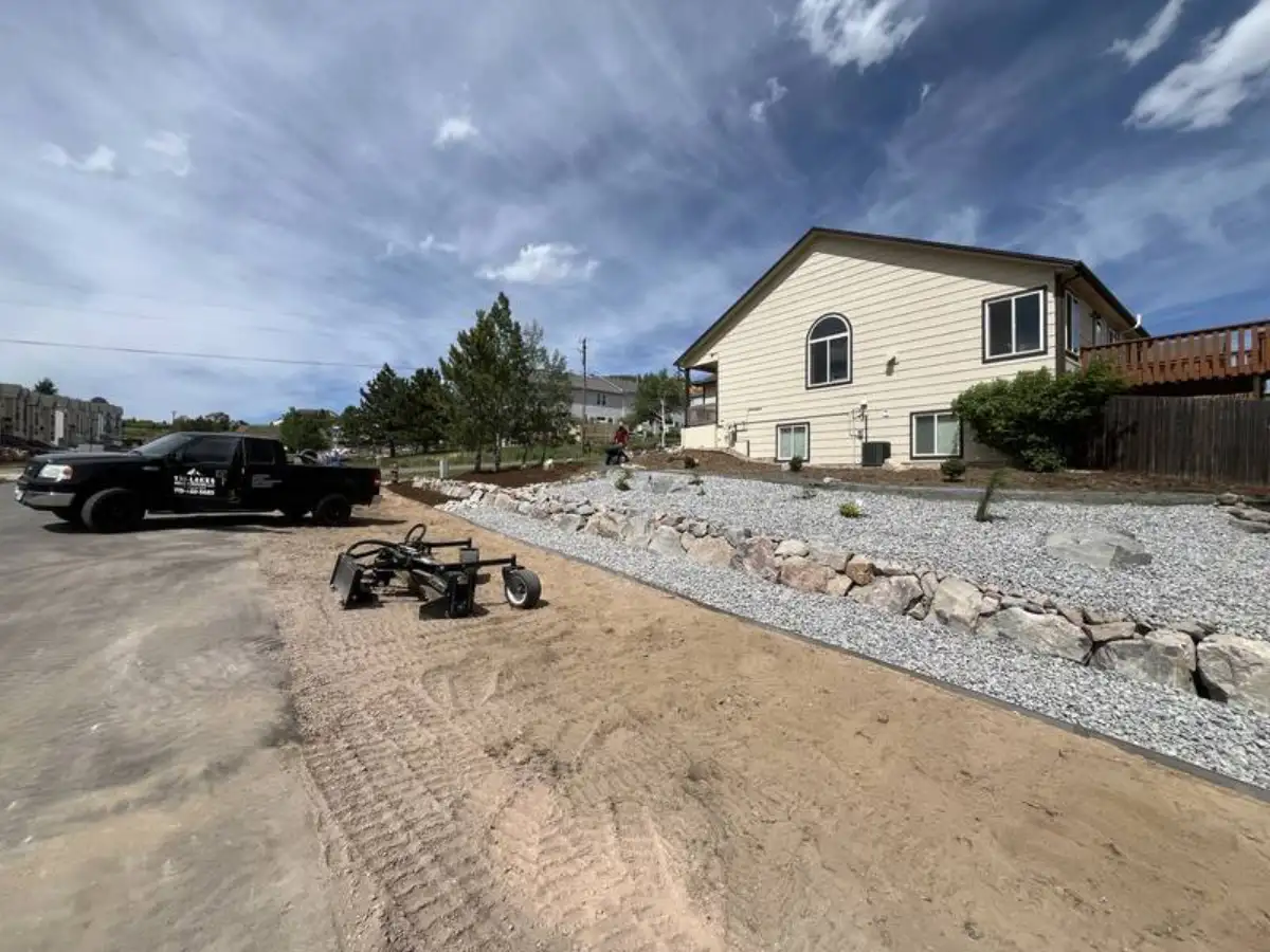 CN Landscaping crew installing drainage system in Colorado Springs